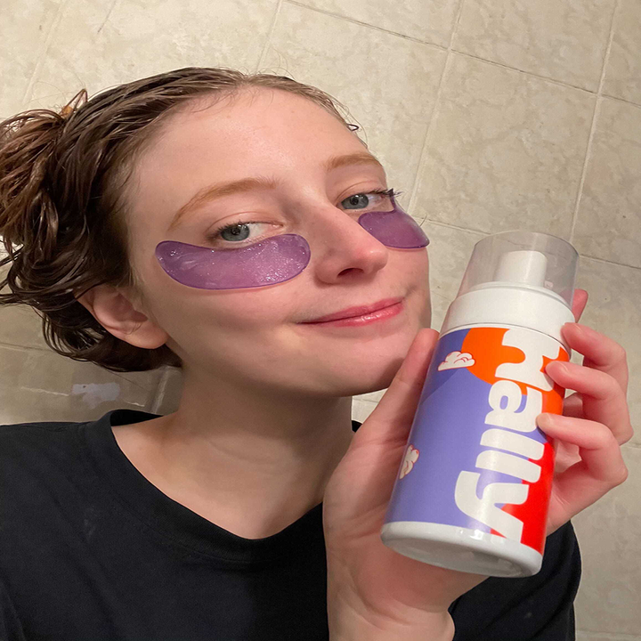 me holding the bottle 