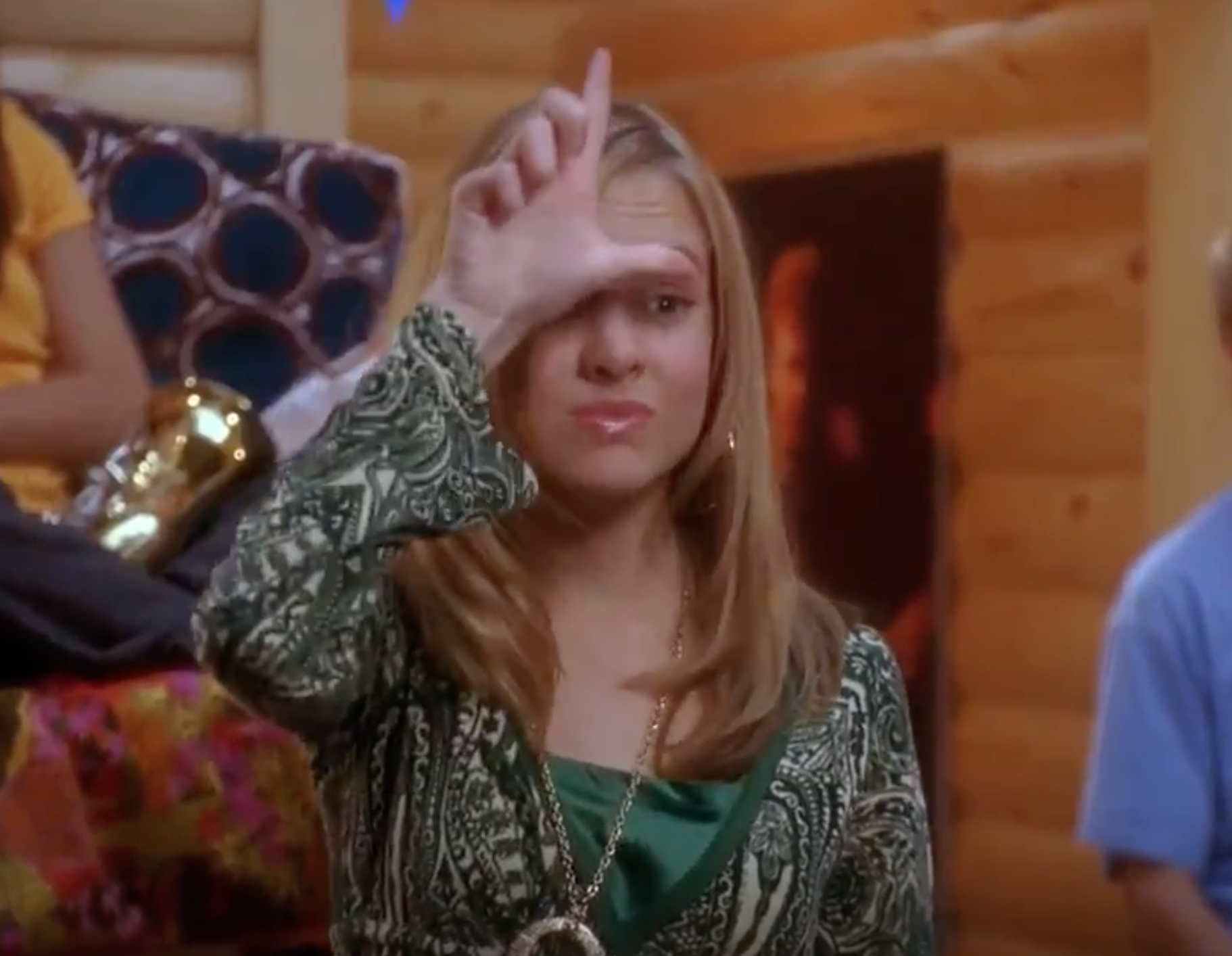 Tess in &quot;Camp Rock&quot; making a loser sign 
