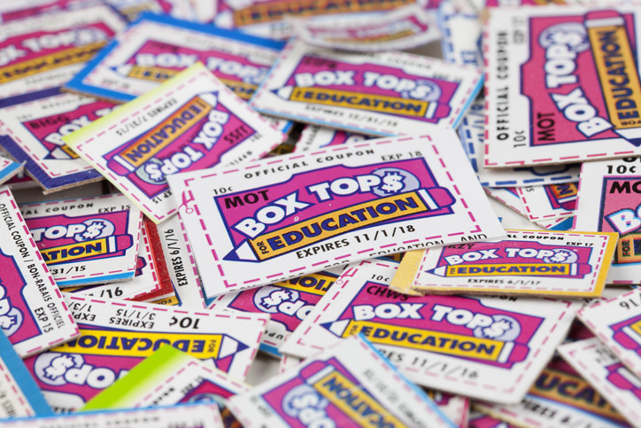 A pile of Box Tops for Education coupons with varying expiration dates, used to raise money for schools