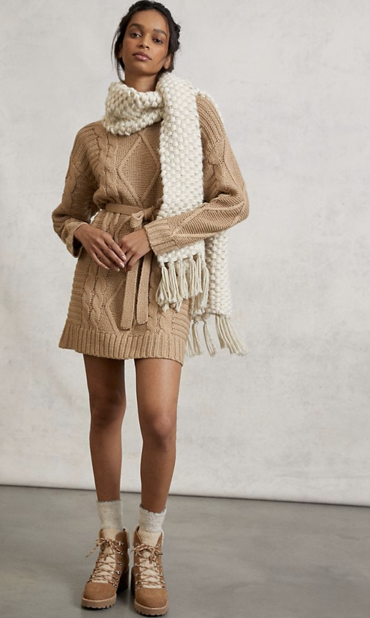 model wears knit sweater dress in cedar