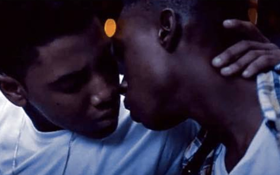 The two main characters kissing as teens at the beach in &quot;Moonlight&quot;