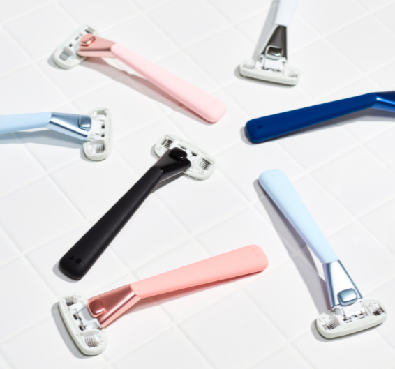 razors with pink blue and black handles