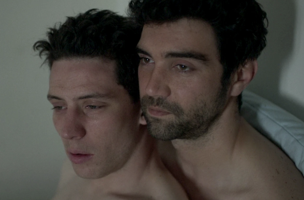 Two men lying next to each other in bed in Netflix&#x27;s &quot;God&#x27;s Own Country&quot;