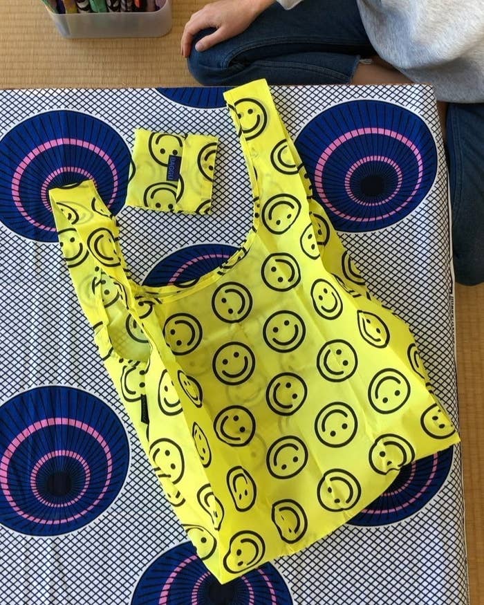 The tote laid out on a tablecloth