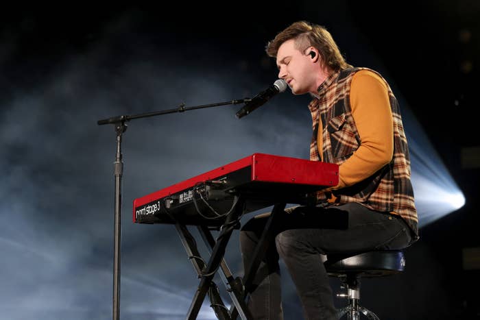 Morgan Wallen plays the keyboard and sings in Nashville&#x27;s Ryman Auditorium in January 2021