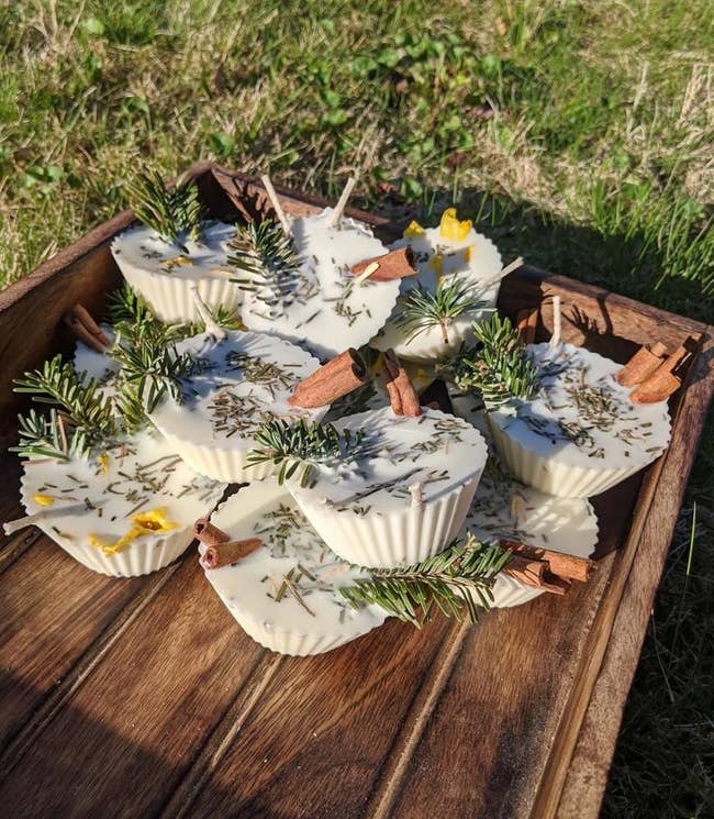 the wax-based fire starters with pine needles, twigs, and flowers