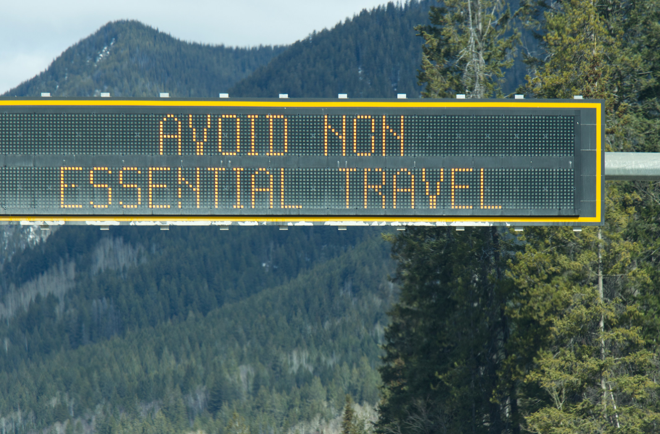 sign on Trans-Canada Highway &quot;Avoid non-essential travel&quot; 