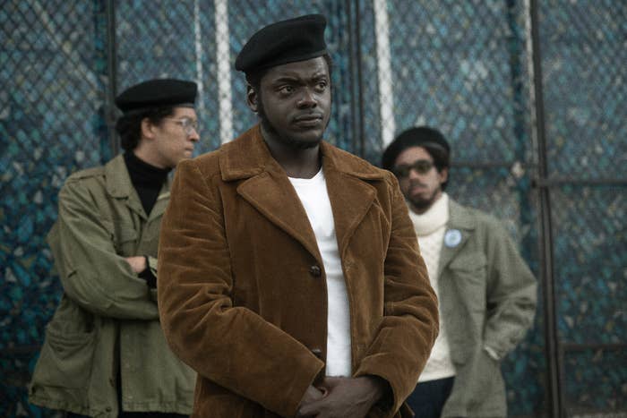 Daniel Kaluuya as Fred Hampton wearing a t-shirt, coat, and a black beret