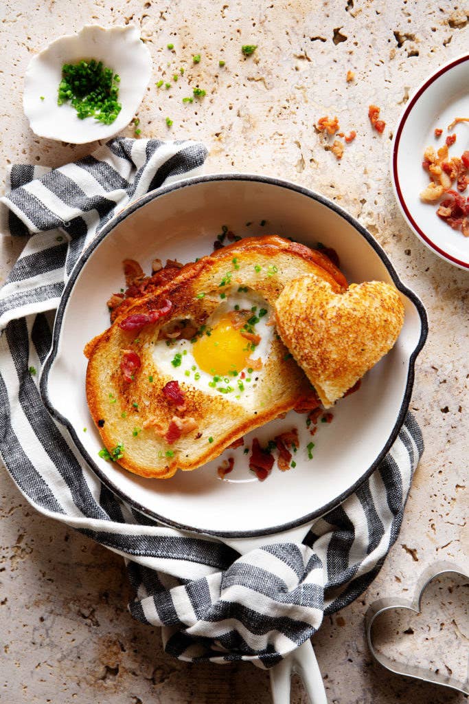 A heart shaped egg in a hole grilled cheese.