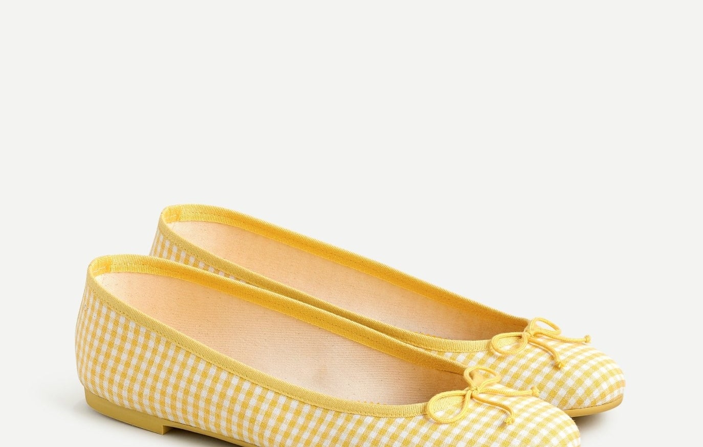 The ballet flats in yellow/ivory