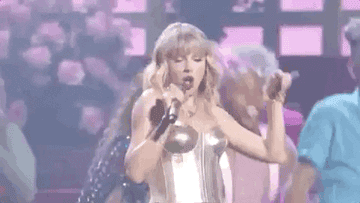 Taylor Swift performing at the VMAs