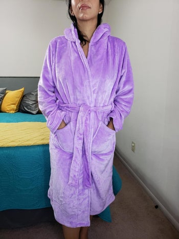 reviewer image of a customer wearing the purple rongtai fleece hooded robe