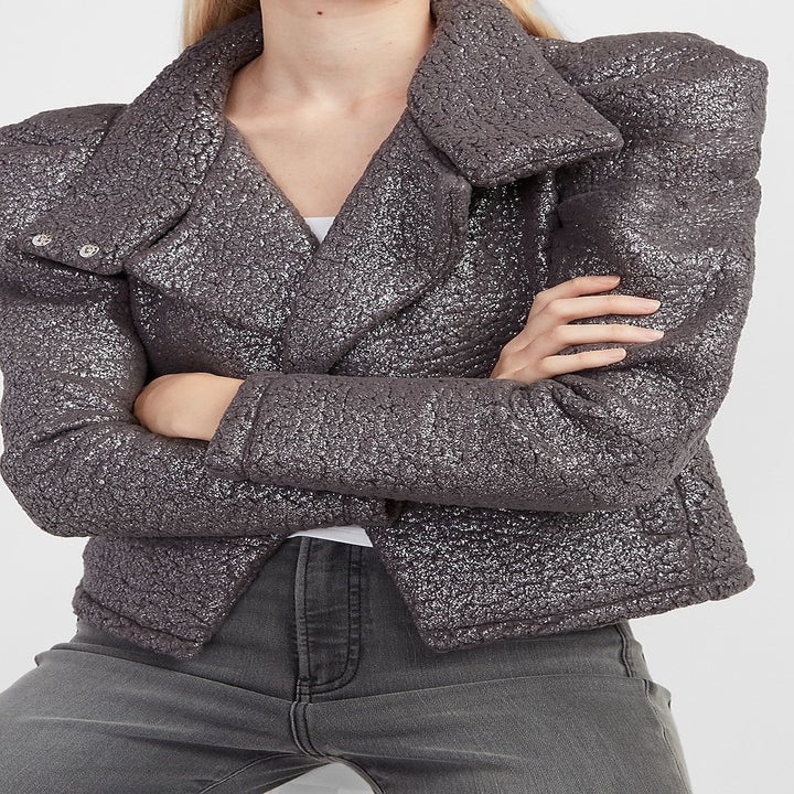 Model wearing the jacket in metallic gray