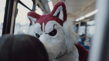 Red Wolf mascot on a bus