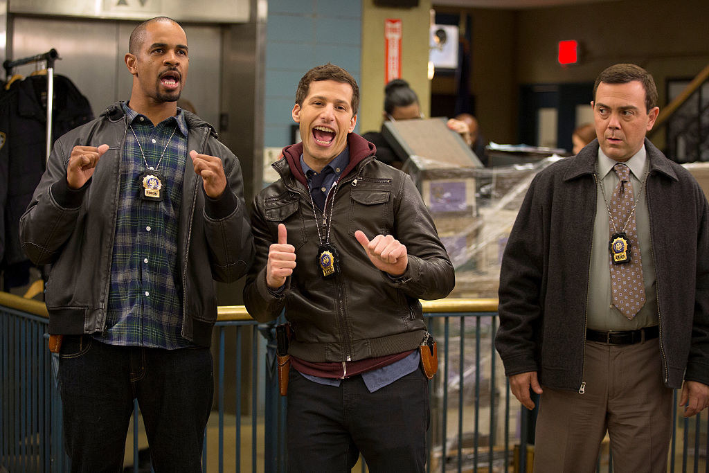 Guest star Damon Wayans, Jr., Andy Samberg and Joe Lo Truglio in the police station