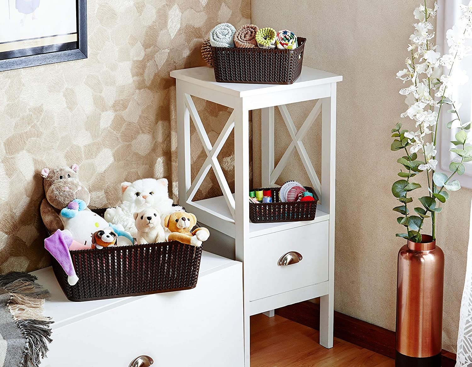 A set of brown baskets with various items in them 
