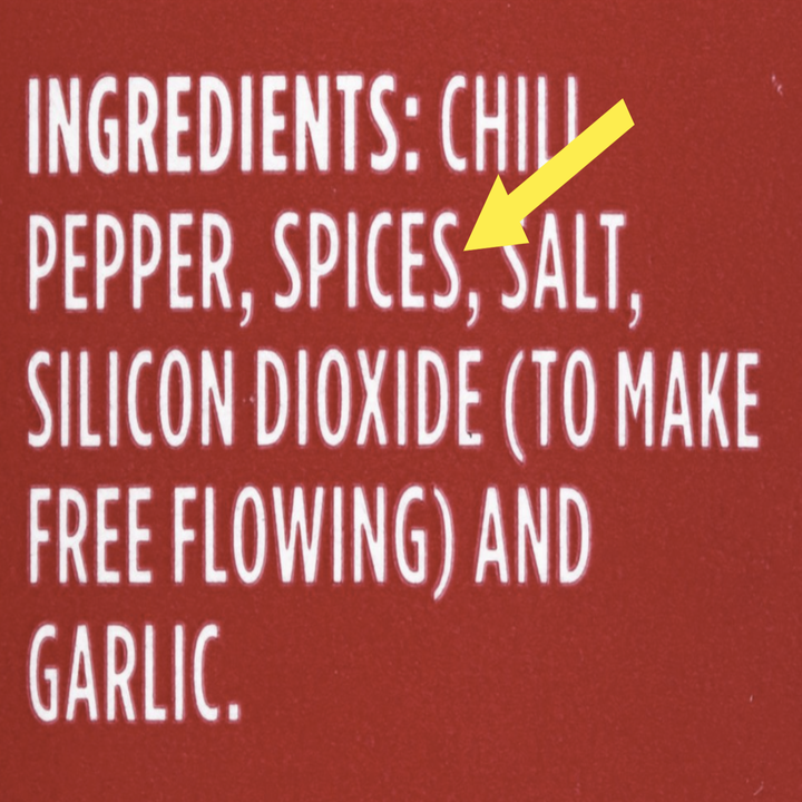 A close-up of the ingredient label on chili powder