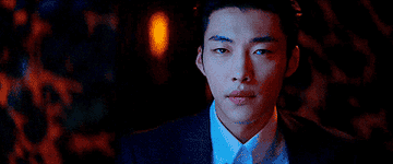 Woo Do-hwan looks unimpressed in a suit