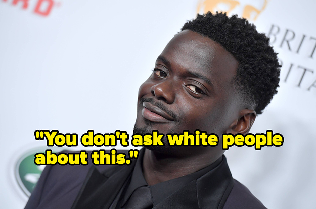 Daniel Kaluuya smiling wearing a dark suit