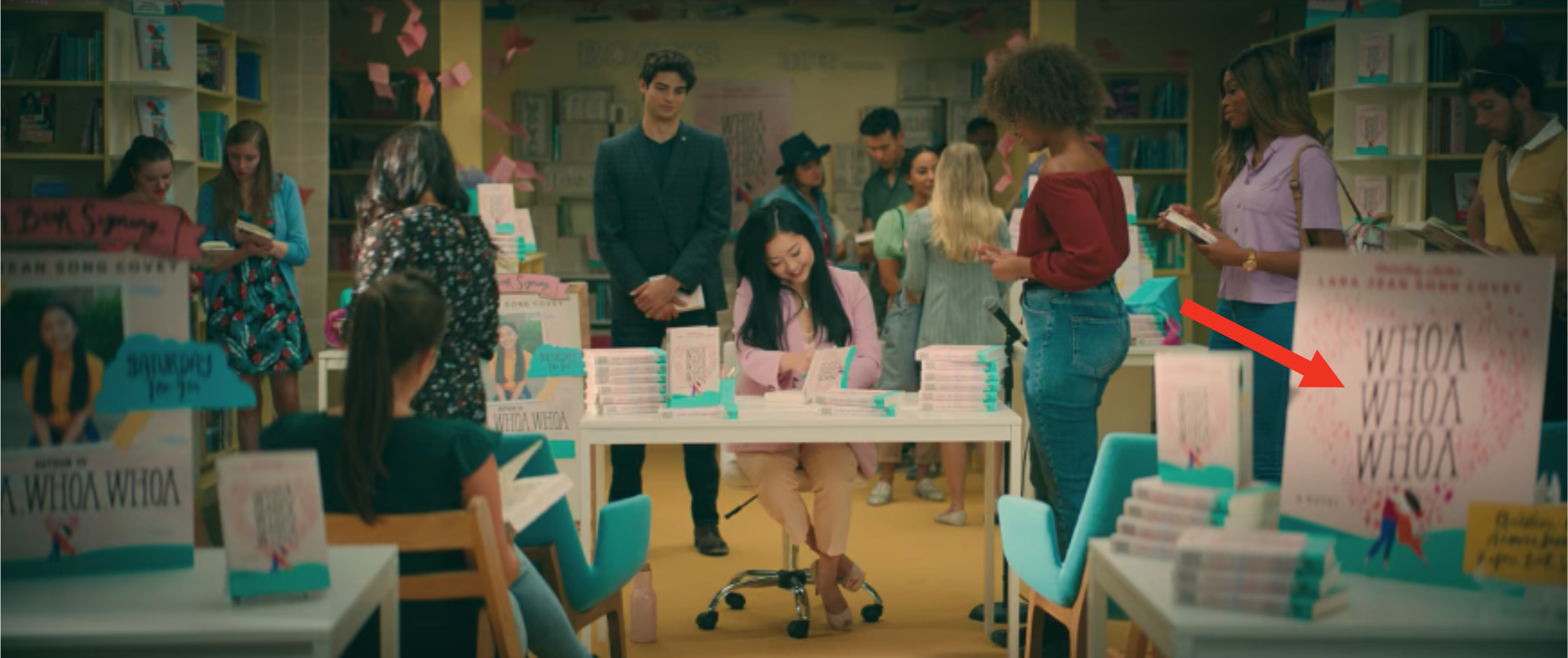Lara Jean and Peter in the future at a book signing for Lara Jean&#x27;s book &quot;Whoh, Whoa, Whoa&quot;