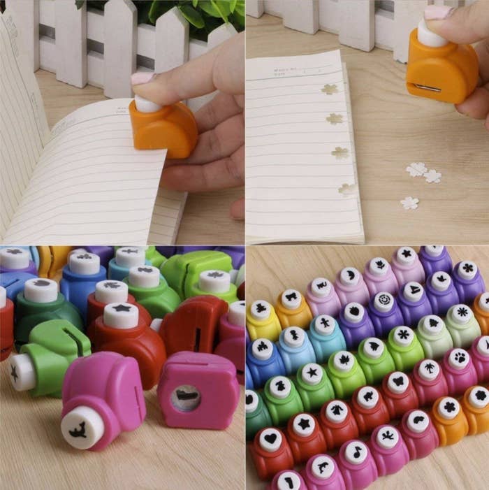 A person using the punches on paper.