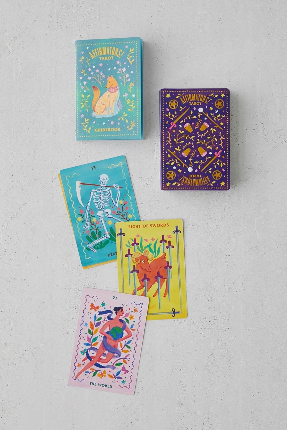 the affirmators tarot deck and a few cards splayed out