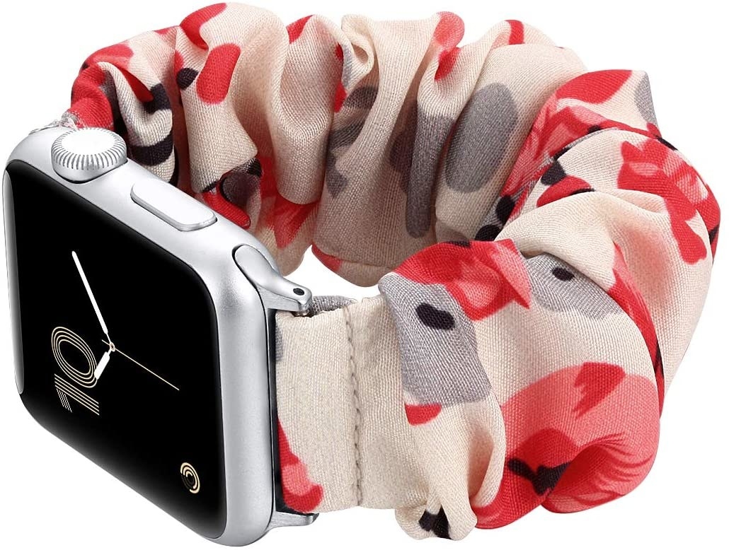 The apple watch connected to a scrunchie-like band