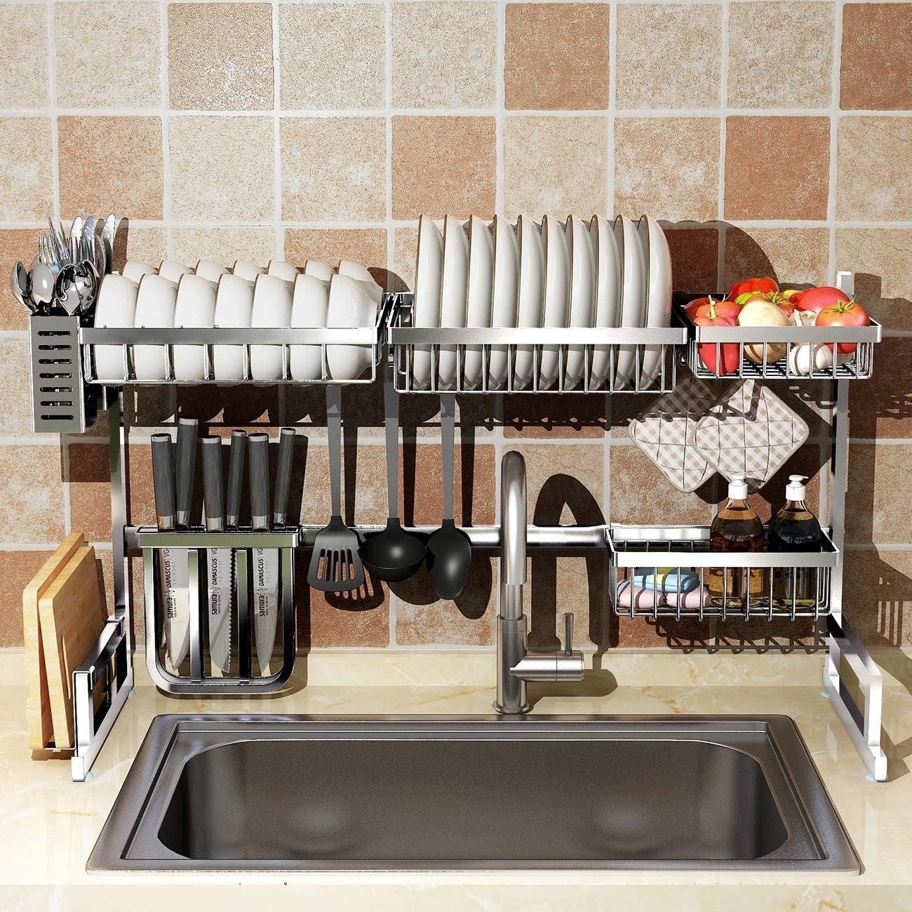 Drying rack around the edges of a sink. It has over a dozen bowls/dishes, a spot holding product, another holding knives, space to hang spoons and spatuals, a shelf for soaps, sponges and dishwashing liquid, and a side that holds cutting boards upright. 