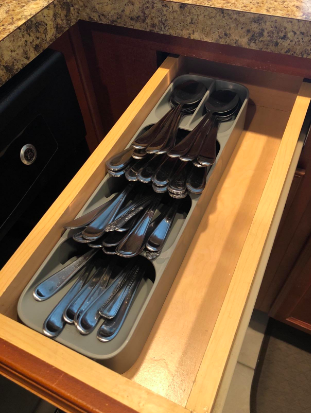 Reviewer's skinny drawer with utensil holder tidily holding all silverware 