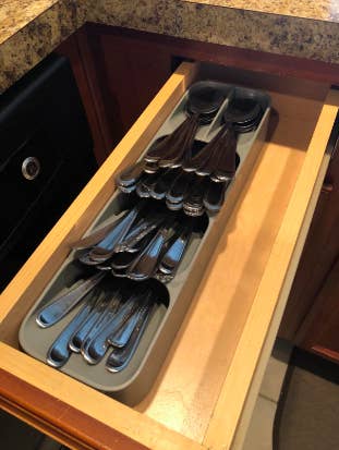Reviewer's skinny drawer with utensil holder tidily holding all silverware
