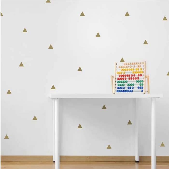 a wall full of the triangle decals