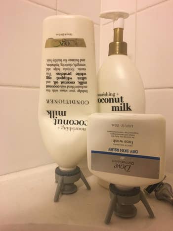 reviewer's photo of the kit used on three shampoo bottles