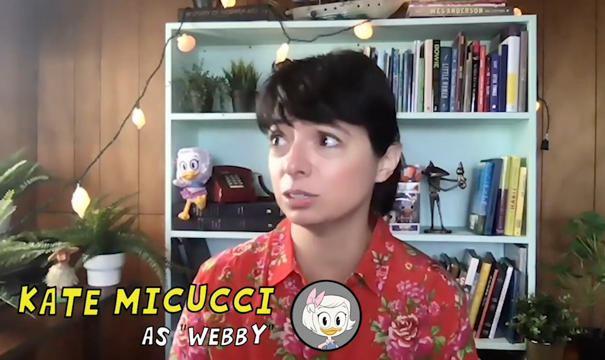 Screen shot of Kate Micucci wearing a floral shirt