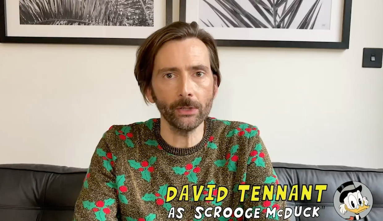 Screen shot of David Tennant wearing a mistletoe-print sweater