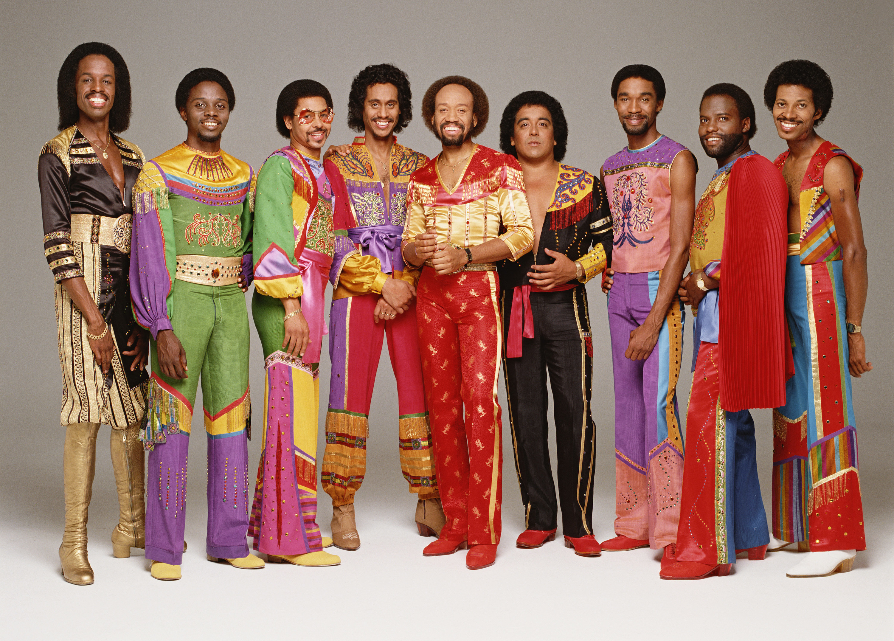 A group portrait of Earth Wind and Fire in costume
