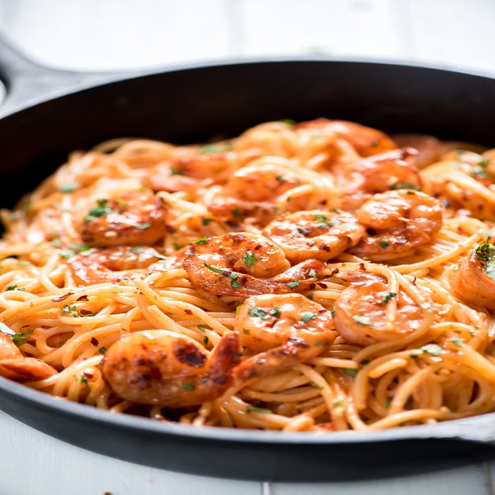 A skillet of creamy shrimp spaghetti.
