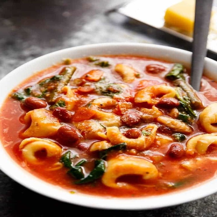 Tortellini and spinach minestrone soup.