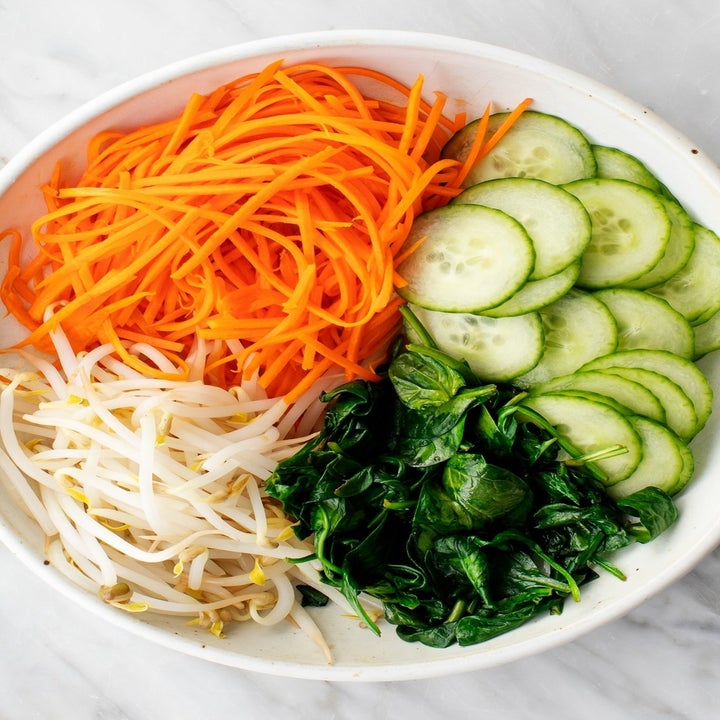 Cucumber, spinach, carrots, and bean sprouts.