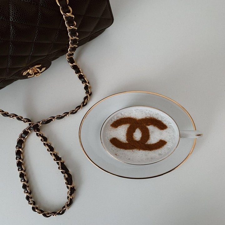a mug of coffee with the dusted design