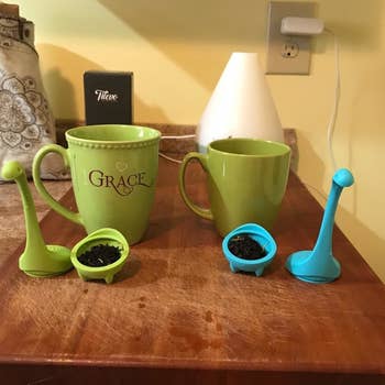 reviewer's photo of the infusers open and filled with loose leaf tea