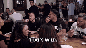 The camera zooms in on Vinny, who&#x27;s at dinner with everyone else, as he says, &quot;That&#x27;s wild,&quot; on Jersey Shore: Family Reunion