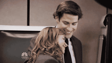 Pam leans into Jim&#x27;s shoulder as he smiles on &quot;The Office&quot;