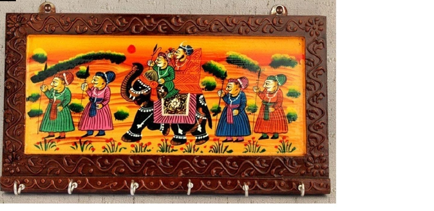 A key holder with a Rajasthani painting on it