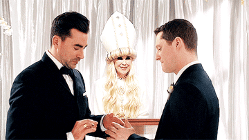 David and Patrick exchanging vows at their wedding