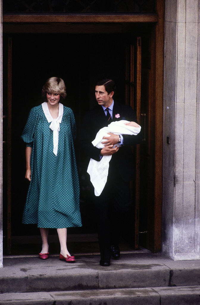 Diana wears a very 80s maternity dress as she and Charles carry William out of the hospital