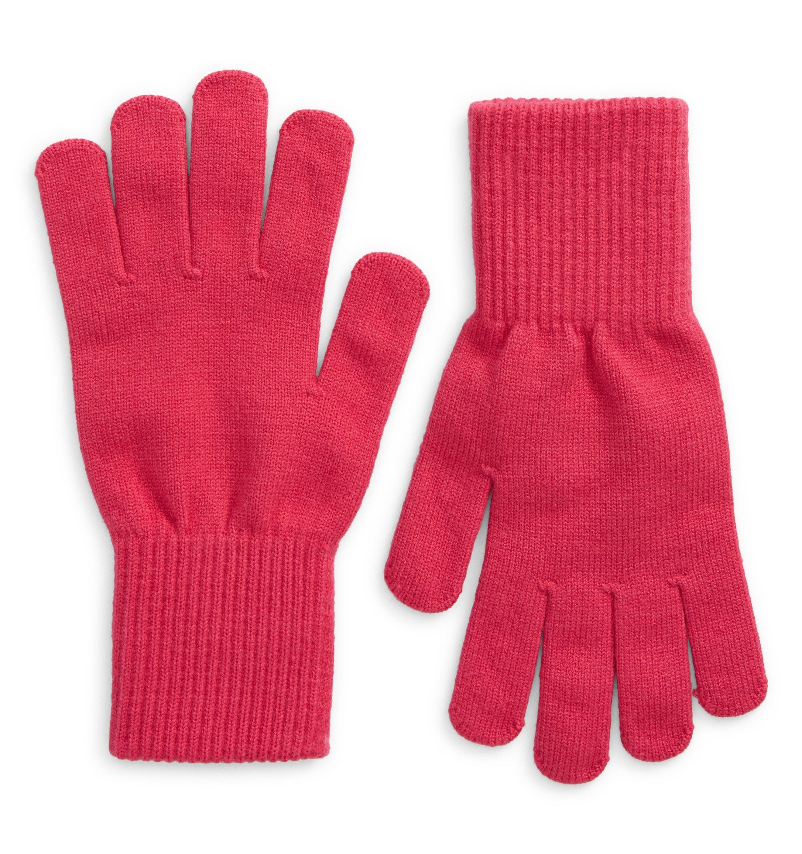 red knit gloves lying on a white background
