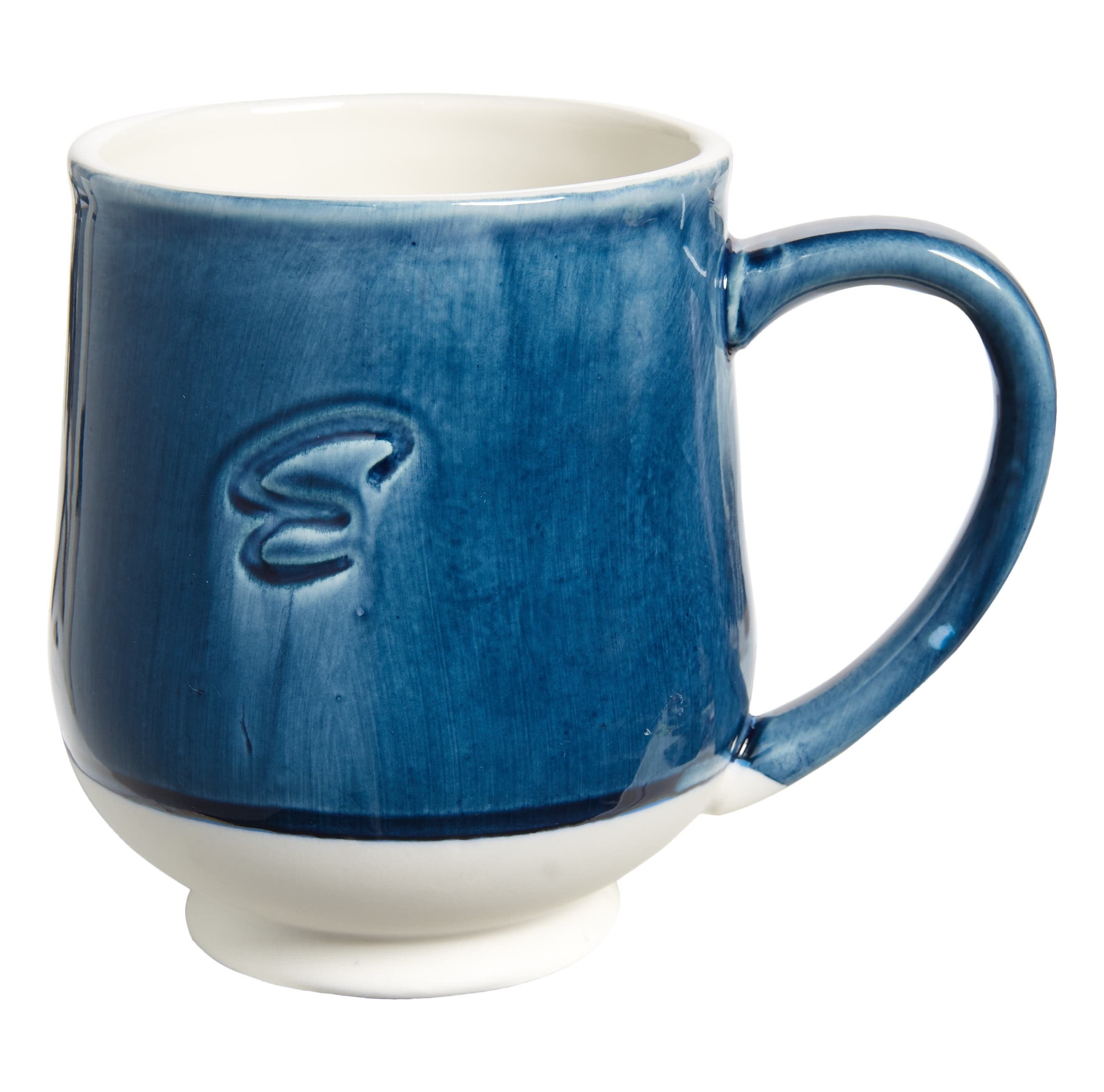 blue monogrammed mug with a glaze over it