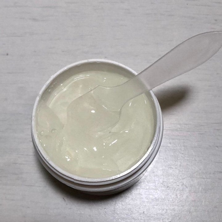 jar of healing gel with lid off showing the gel consistency 