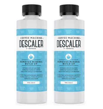 Two bottles of descaler solution