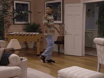 Will turns around in a circle, looking around, before pointing at himself questioningly on Fresh Prince of Bel Air